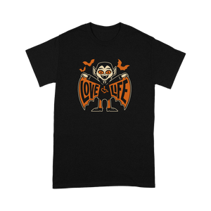 The black tshirt shows a smiling, happy Dracula with orange eyes wearing a 3E love branded shirt. Dracula's wings are spread, showing the words "Love" and "Life" on either side as 3 bats fly around Dracula's head.