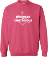 Pink pullover sweatshirt. Our trademarked International Symbol of Acceptance ("wheelchair heart symbol") sits behind the phrase Kindness is Contagious boldly displayed on your chest.