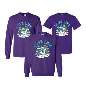 2021's limited edition holiday design features a jolly snowman sporting a 3E Love knit scarf and holding a warm mug of hot cocoa. Available in a long-sleeve t-shirt, short-sleeve t-shirt, or crewneck sweatshirt.