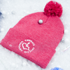 Heather Red adult knit beanie hat w/ cuff and pom featuring our Circle of 3E Love embroidered with white threads