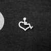 Silver lapel pin of our International Symbol of Acceptance ("wheelchair heart symbol"). 
