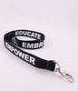 Black Lanyards feature our International Symbol of Acceptance ("wheelchair heart symbol") and the three E's, Embrace, Educate and Empower.