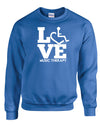 Royal blue crewneck sweatshirt. Our trademarked International Symbol of Acceptance ("wheelchair heart symbol") is featured proudly on your item