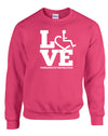 Pink crewneck sweatshirt. Our trademarked International Symbol of Acceptance ("wheelchair heart symbol") is featured proudly on your item