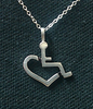 Large Pendant Necklace. The sterling silver pendant on this necklace is in the shape of our trademarked International Symbol of Acceptance (Wheelchair Heart). Item is individually handcrafted and will last forever.